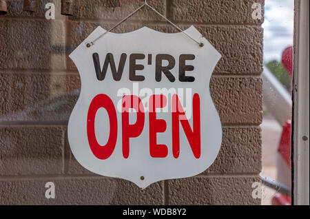 Winslow Arizona, US. May 23, 2019. We re open sign on a store wall. Historic route 66 Stock Photo