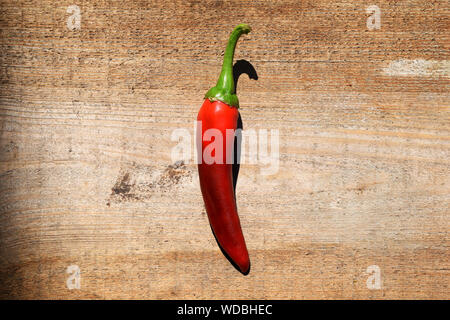 Retro pepper wood Board, great design for any purpose. Tree old vintage blackboard texture background. Old wooden texture background. Food background. Stock Photo