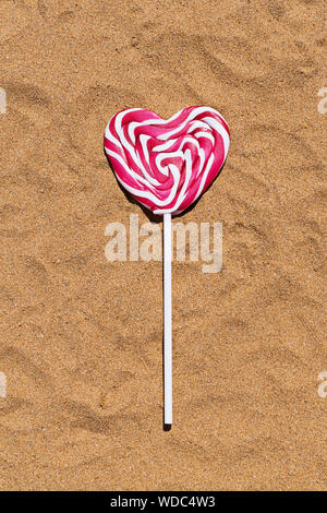 Closeup of a greetings " HAPPY Valentine's DAY" with gifts and hearts