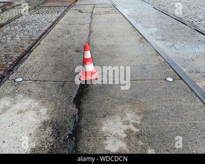 Download Traffic cone on wet road Stock Photo: 19338584 - Alamy Yellowimages Mockups