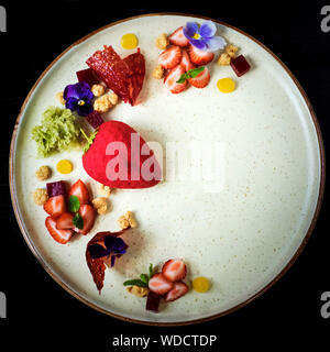 Strawberry Shaped Almond Sponge Cake With Fruits In Plate On Table