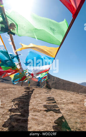 Tibetan, buddhist prayer flags in the Himalayas. Stock Photo