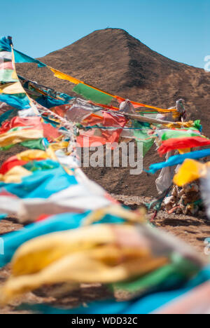 Tibetan, buddhist prayer flags in the Himalayas. Stock Photo