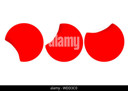 Three blank red stickers with curled side on a white background with place for text. Top view. Isolated. Stock Photo