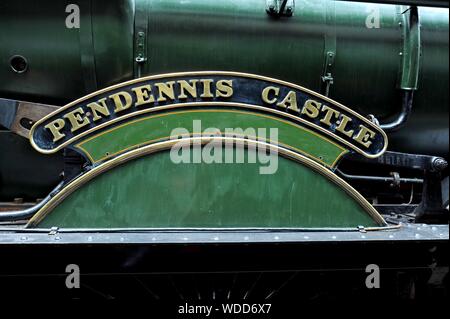 The nameboard of GWR Castle class steam locomotive No.4079 ‘Pendennis Castle’ at Didcot Railway Centre, Oxfordshire Stock Photo