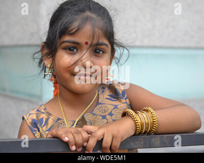 Pakistani Girl posing in National dress | ImageMela.com