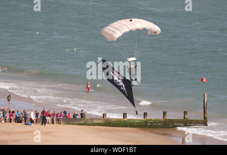 A member of the Tigers Freefall Parachute Display Team performs for the crowds on day one of the Bournemouth Air Festival 2019. Stock Photo