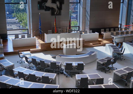 Hannover, Germany, August 24., 2109: View from above of the plenary hall with the lectern, the coat of arms of Lower Saxony and the flags of Germany, Stock Photo