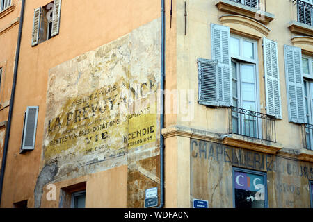 Old Painted Wall Advert Advertising Insurance and Old Facade on Historic Building on the Cours Mirabeau Aix-en-Provence Provence France Stock Photo