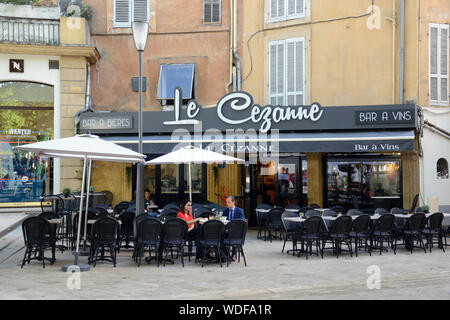 Couple Drinking Coffee at the Le Cezanne Bar & Pavement Cafe near the Rotonde Town Square Old Town Aix-en-Provence France Stock Photo