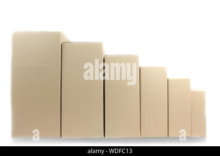 Cardboard parcel boxes stacked on each other at white background Stock Photo