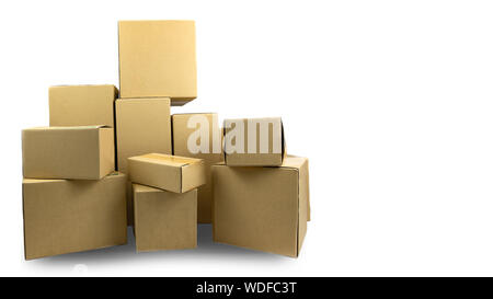 Cardboard parcel boxes stacked on each other at white background Stock Photo