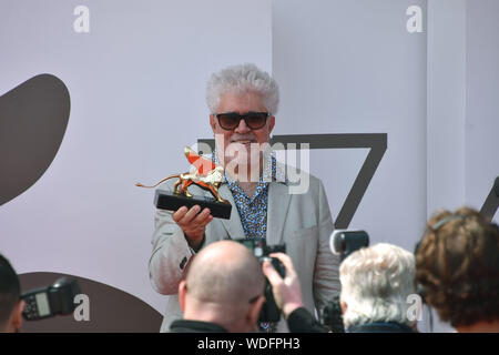 VENICE, Italy. 29th Aug, 2019. Pedro Almodovar shows the Golden Lion at Palazzo del Cinema after receiving it for lifetime achievements during the 76th Venice Film Festival on August 29, 2019 in Venice, Italy. Credit: Andrea Merola/Awakening/Alamy Live News
