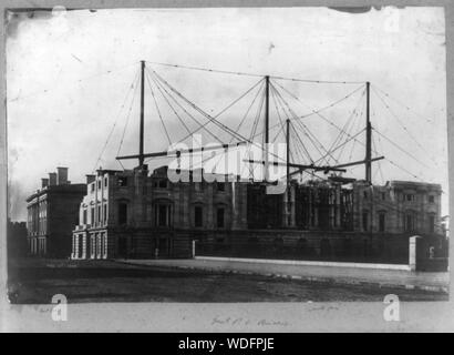 Genl. P.O. Building Photograph showing construction of the east face and north faces of the General Post Office building in Washington, D.C. Stock Photo