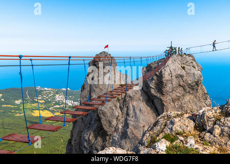 Ai-Petri, Crimea - July 5, 2019. Suspension bridge on top of mountain Stock Photo