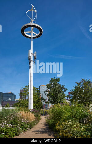 Gardens and lighting mast in the Queen Elizabeth Olympic Park, Stratford, London, in summertime Stock Photo