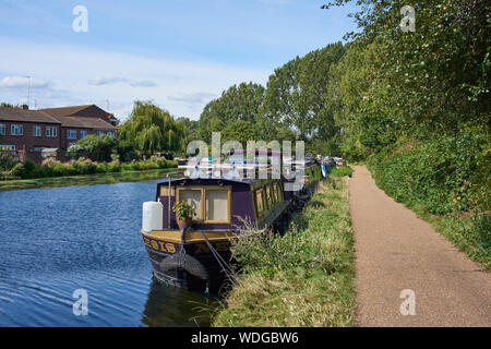 Narrowboats along the River Lea Navigation near Hackney Marshes, North East London UK Stock Photo