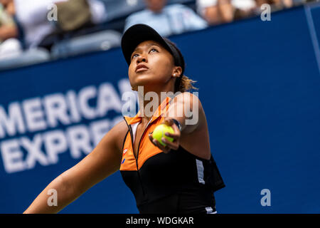 Naomi Osaka (JPN) competing in the first round of the 2019 US Open Tennis wearing her new NikeCourt x Sacai tennis outfit Stock Photo