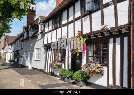 Tudor timber framed black and white medieval charter house. West Street, Warwick, Warwickshire, England Stock Photo