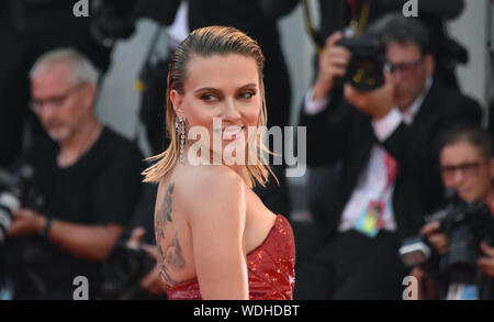 VENICE, Italy. 29th Aug, 2019. Scarlett Johansson walks the red carpet ahead of the 'Marriage Story' screening during the 76th Venice Film Festival at Sala Grande on August 29, 2019 in Venice, Italy. Credit: Andrea Merola/Awakening/Alamy Live News Stock Photo