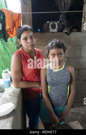 Usumatlan, Zacapa, Guatemla. 10th Aug, 2019. Portraits of the Morales Lopez family who live in a modest home in Usumatlan, Zacapa in the east central highlands of Guatemala. Mother Irma Noemi Morales Lopez left the family under the care of her husband Eliu and young teenage daughter to make the perilous journey to the United States to find work. Credit: Bob Daemmrich/ZUMA Wire/Alamy Live News Stock Photo