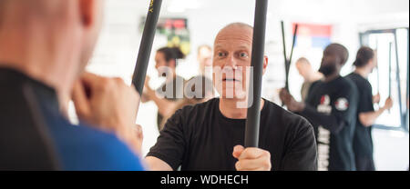 ISTANBUL, TURKEY - Maj 30 - Jun 02. 2019. Group of martial arts students practice filipino escrima stick fighting training on GENERAL MEETING OF KAPAP Stock Photo