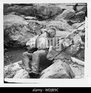 Gettysburg, Pennsylvania. Dead Confederate sharpshooter at the foot of Round Top Stock Photo