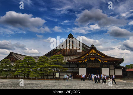 Tourists approaching the palace entrance at Nijo Castle, Kyoto, Japan, created for a Shogun ruler in the 16th century Stock Photo