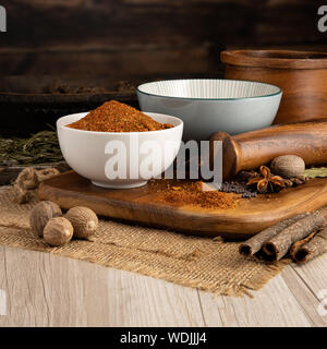 BBQ Seasoning Rub in a bowl and food preparation and kitchen set Stock Photo