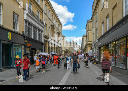 BATH, ENGLAND - JULY 2019: People walking through the shopping centre in the city of Bath. Stock Photo