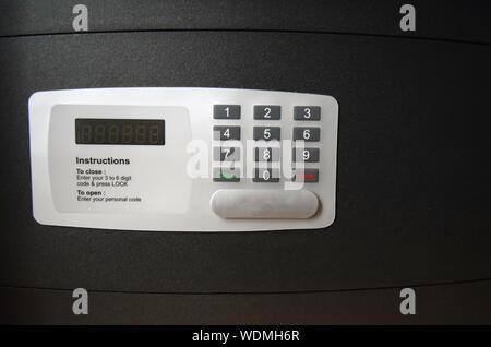 Safe box, code lock on the safe door, closeup Stock Photo