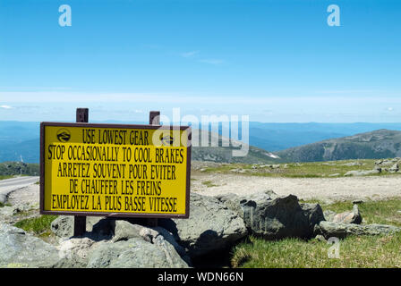 Use lowest gear sign along the Mount Washington Auto Road, near the summit of Mount Washington, in the White Mountains, New Hampshire. Stock Photo