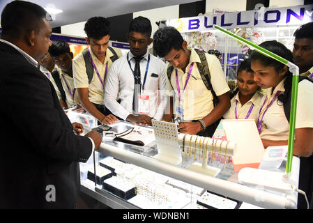 Colombo, Sri Lanka. 29th Aug, 2019. People visit the International Gem and Jewellery show in Colombo, Sri Lanka, on Aug. 29, 2019. The International Gem and Jewellery show, which is held from Aug. 29 to Sept. 1, draws hundreds of local and foreign exhibitors and a large number of influential trade visitors from around the world. Credit: Gayan Sameera/Xinhua Stock Photo