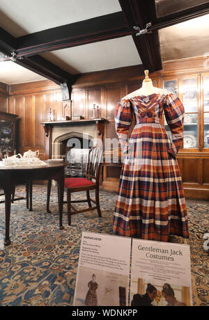 Marian Lister's costume in Shibden Hall, historic house, home of Anne Lister and film location for the BBC's 'Gentleman Jack', Halifax, West Yorkshire Stock Photo