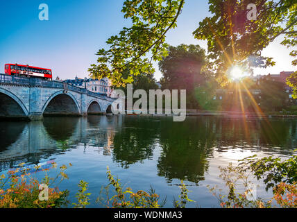 Richmond bridge landmark over the river Thames early in the morning at sunrise in London, England Stock Photo