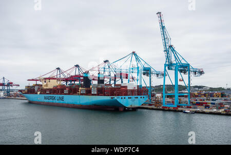 GOTHENBURG, SWEDEN - MAY 16, 2017: The large container ship Marie Maersk is docked near cranes in Gothenburg harbor. Stock Photo