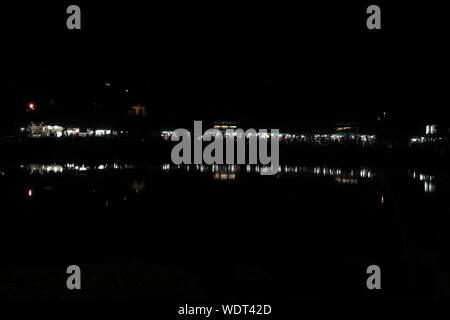 Tourist attraction Images taken at Kodaikanal tamilnadu India from top of the hill. Night view of lake Stock Photo