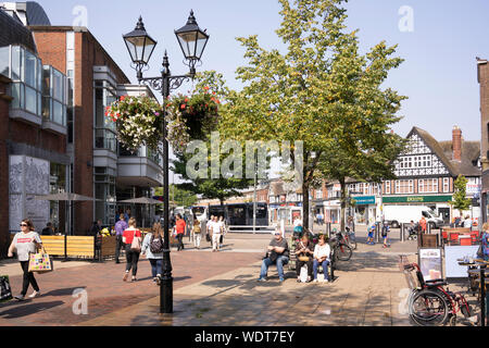 Shoppers on the High Street and Station Road in Solihull town centre in August. England Stock Photo