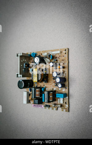 layout of an electronic circuit board. precise function unknown, but they come from a television set. Stock Photo