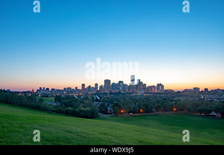 The city of Edmonton downtown skyline during dusk on a summer evening Stock Photo