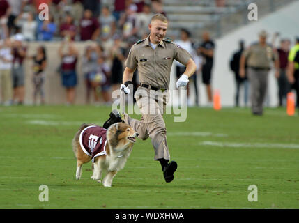College Station, Texas, USA. 29th Aug, 2019. August 29, 2019: Texas A&M Aggies cadet and reveille coming running out of the tunnel during the game between the Texas State University Bobcats and the Texas A&M University Aggies at Kyle Field Stadium in College Station, TX. Texas A&M Aggies leads the first half against Texas State Bobcats, 28-0. Patrick Green/CSM Credit: Cal Sport Media/Alamy Live News