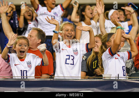 Philadelphia, United States. 29th Aug, 2019. Philadelphia, PA - Young girls and US soccer fans celebrate a goal during the United States Women's National Team soccer match against Portugal. The USWNT won 4-0 during their World Cup victory tour. Credit: Don Mennig/Alamy Live News Stock Photo