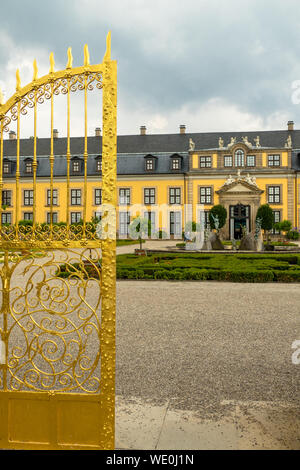 Entrance into the garden of castle in 'Herrenhaeuser Gaerten' in Hannover with golden gate shining Stock Photo