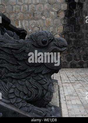 Detail of a carved dragon balustrade at the Tomb of Emperor Khai Dinh in Hue Vietnam Stock Photo