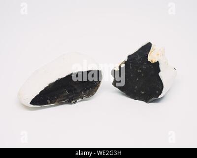 Sharp broken basalt stone with some cavity inside, isolated on white ...