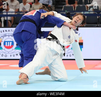 Tokyo, Japan. 30th Aug, 2019. Ma Zhenzhao (R) of China competes with Klara Apotekar of Slovenia during the quarterfinal match of women's 78 kg category at the 2019 World Judo Championships in Tokyo, Japan, on Aug. 30, 2019. Credit: Du Xiaoyi/Xinhua/Alamy Live News Stock Photo
