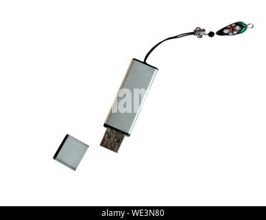 Silver flash drive isolated on white background. Data storage hardware. Stock Photo