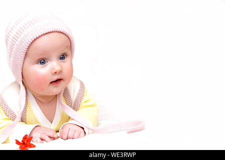 newborn european baby girl boy with flower 3 months old isolated Stock Photo