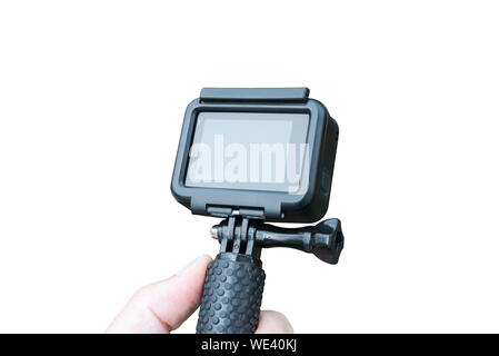 Isolated action camera on stick. Close-up. Blank screen for mockup. Stock Photo