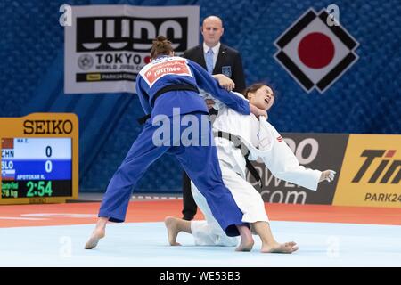 Tokyo, Japan. 30th Aug, 2019. Klara Apotekar (SLO) fights against Zhenzhao Ma (CHN) during the Quarter-final match of women's -78kg category at World Judo Championships Tokyo 2019 in the Nippon Budokan. The World Judo Championships is held from August 25 to September 1st. Credit: Rodrigo Reyes Marin/ZUMA Wire/Alamy Live News Stock Photo